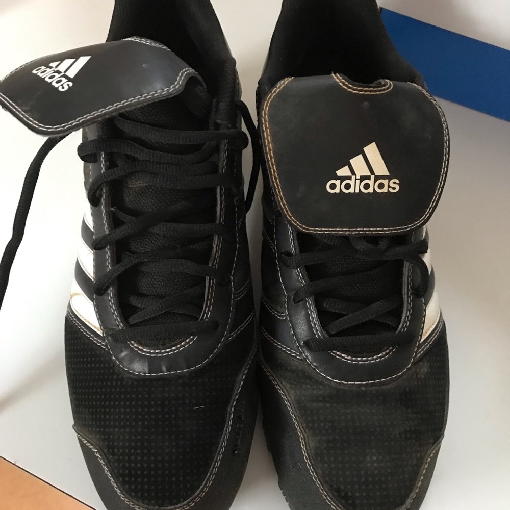Black Adidas cleats
